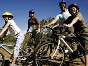 family exercising together on a sunny day