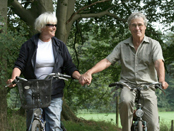 Senior couple cycling